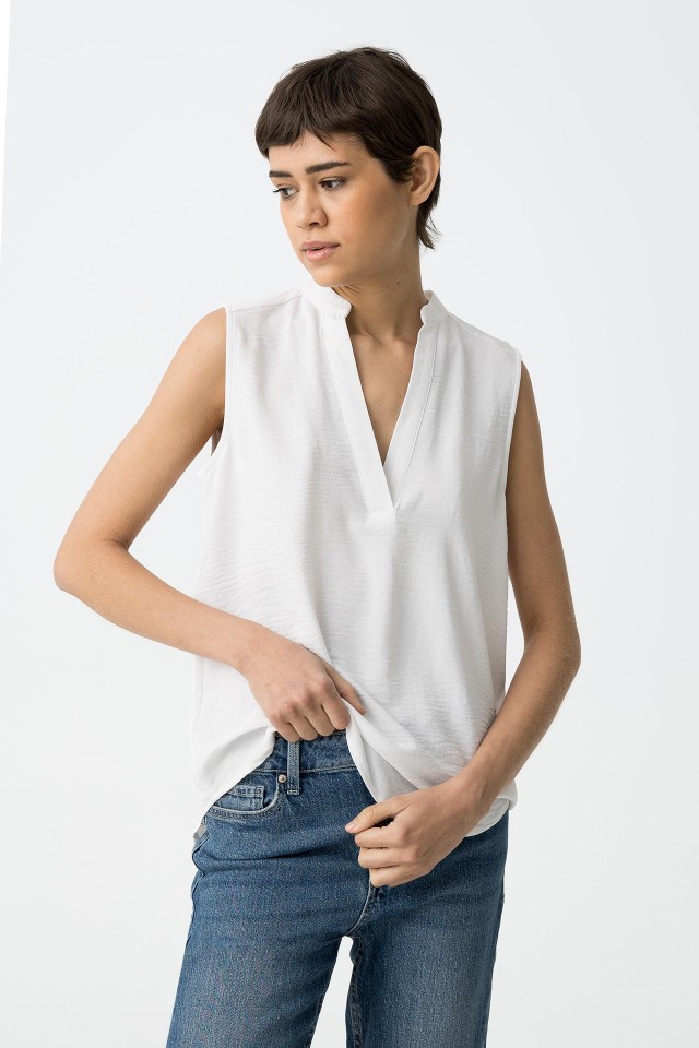 Blusa de mangas de sisa