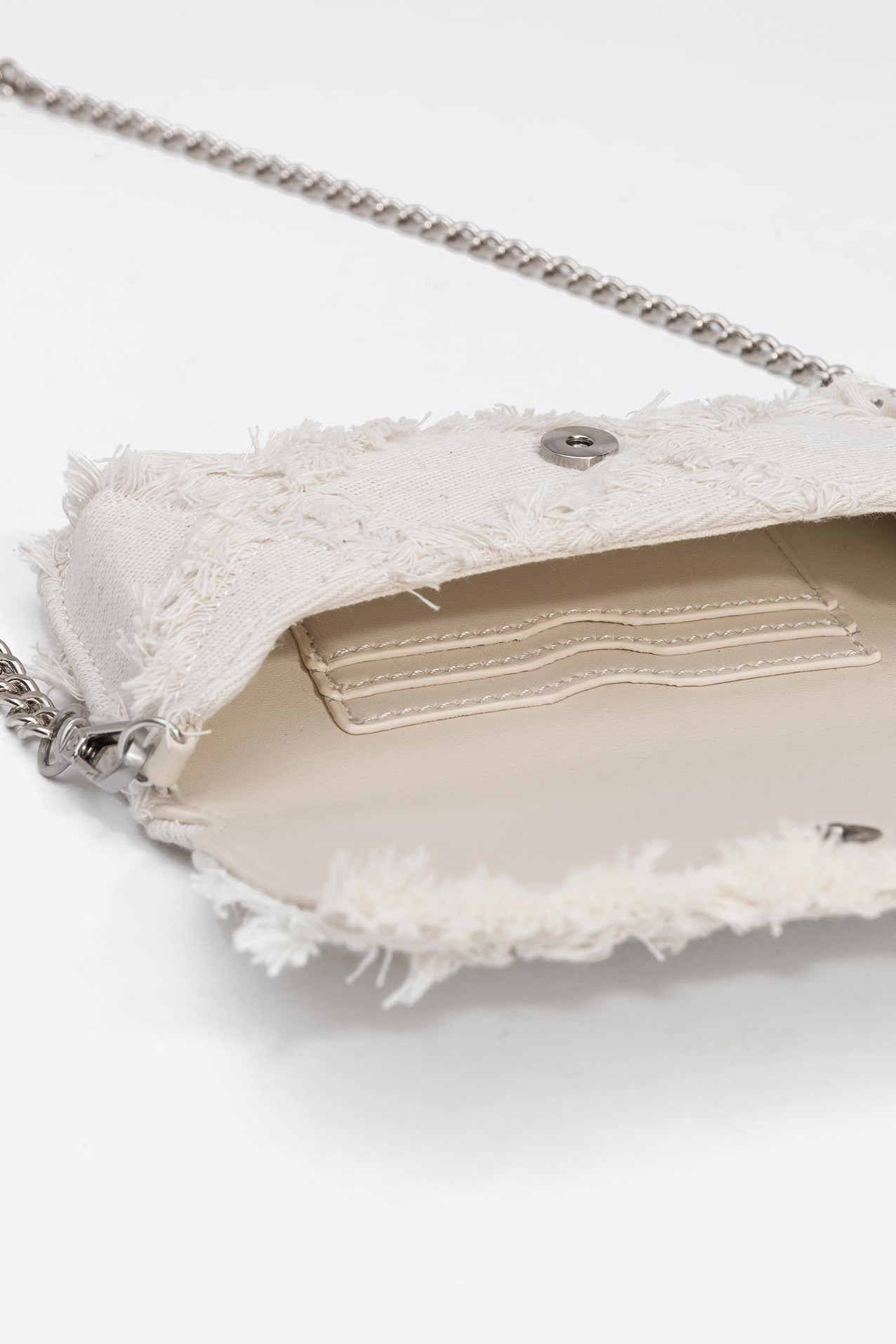 Soporte para telfono de tela con flecos