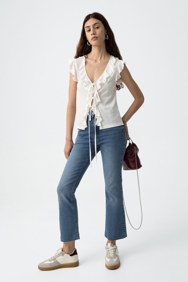 Vaqueros capri acampanados Megan