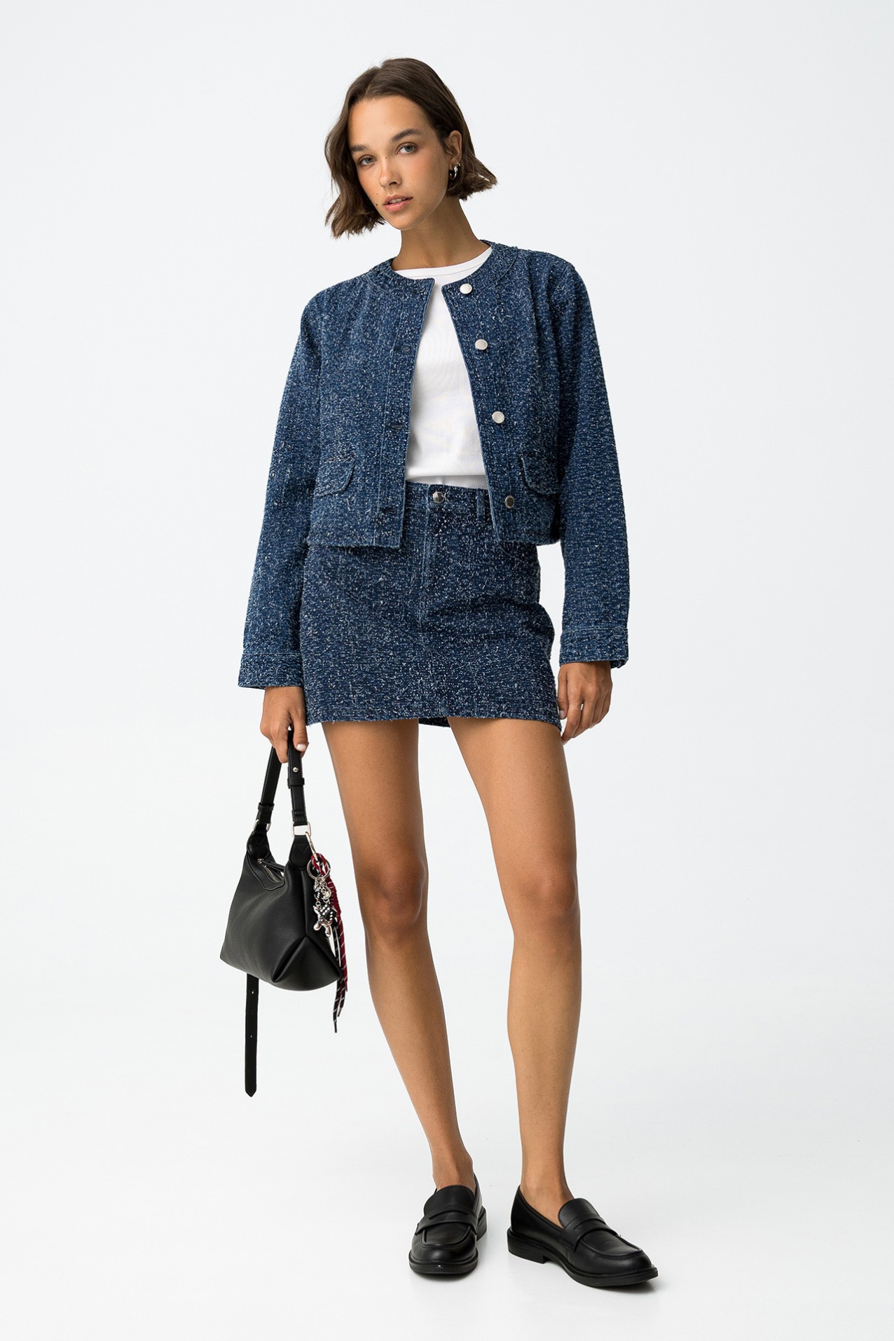 Destroyed denim jacket with chunky stud