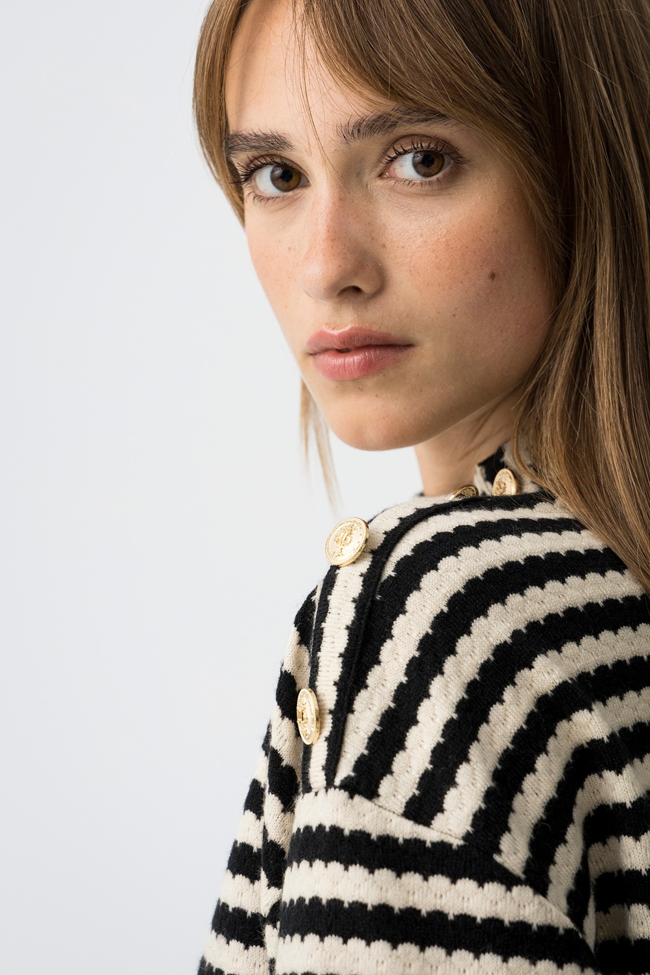 Jersey de punto a rayas con botones decorativos
