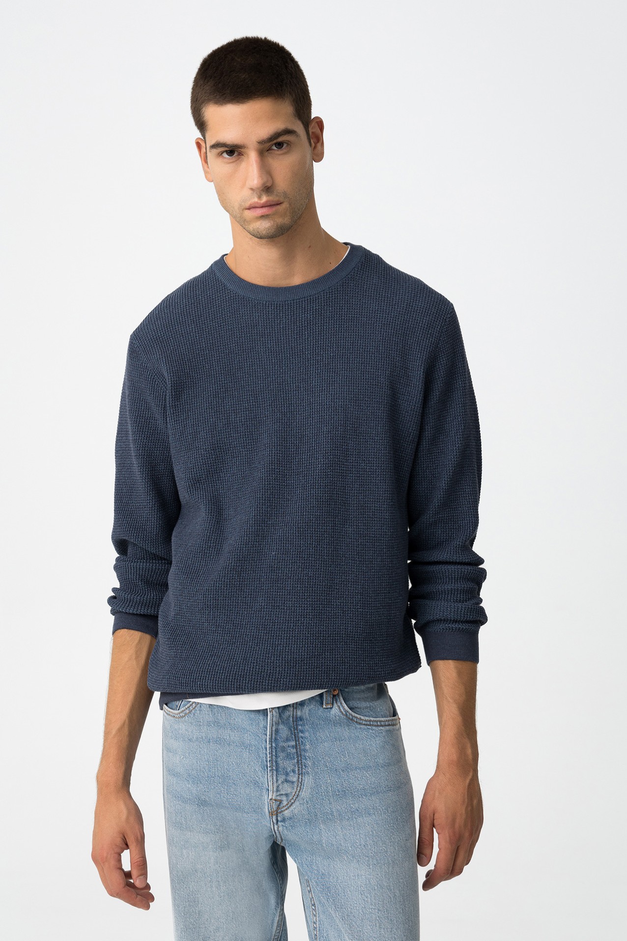 Camisola azul tricotada