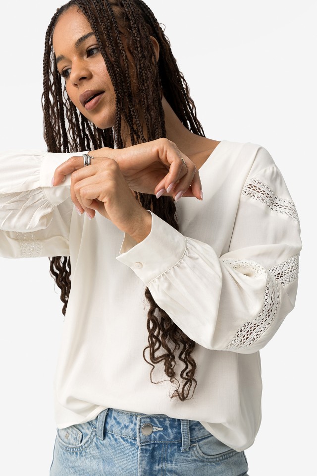Blouse with lace inserts