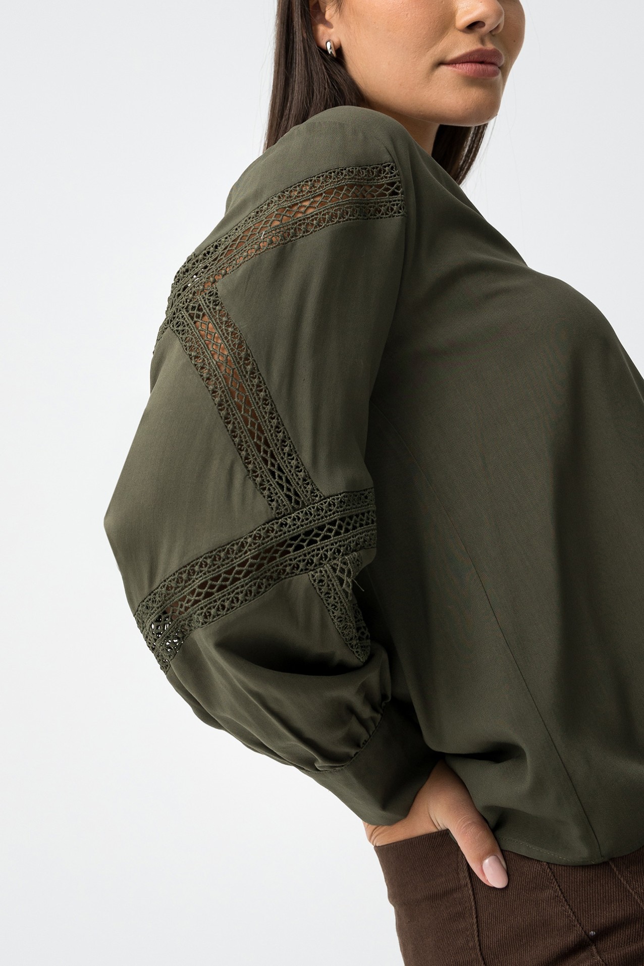 Blouse with lace inserts