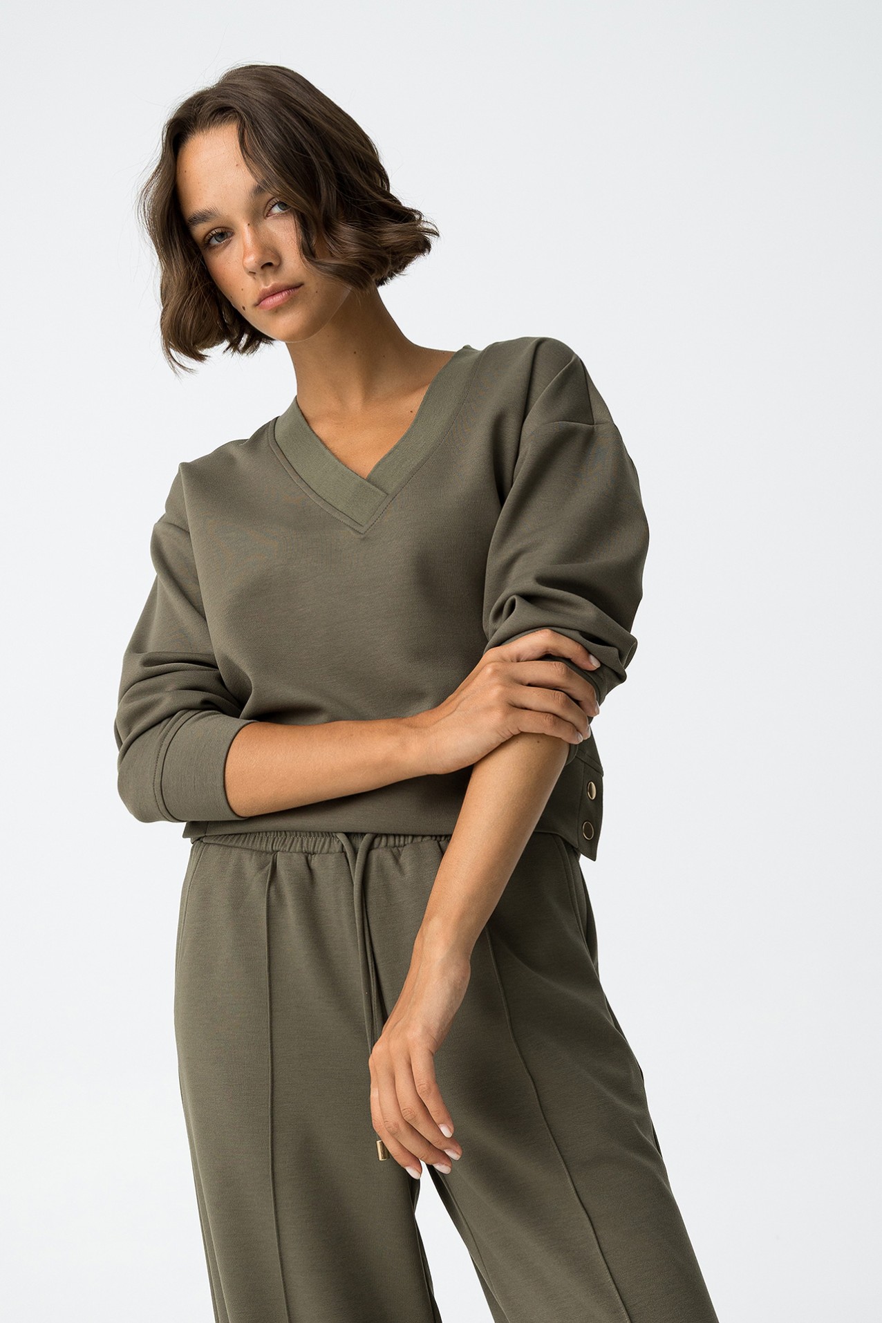 Sweat com Botes Metlicos