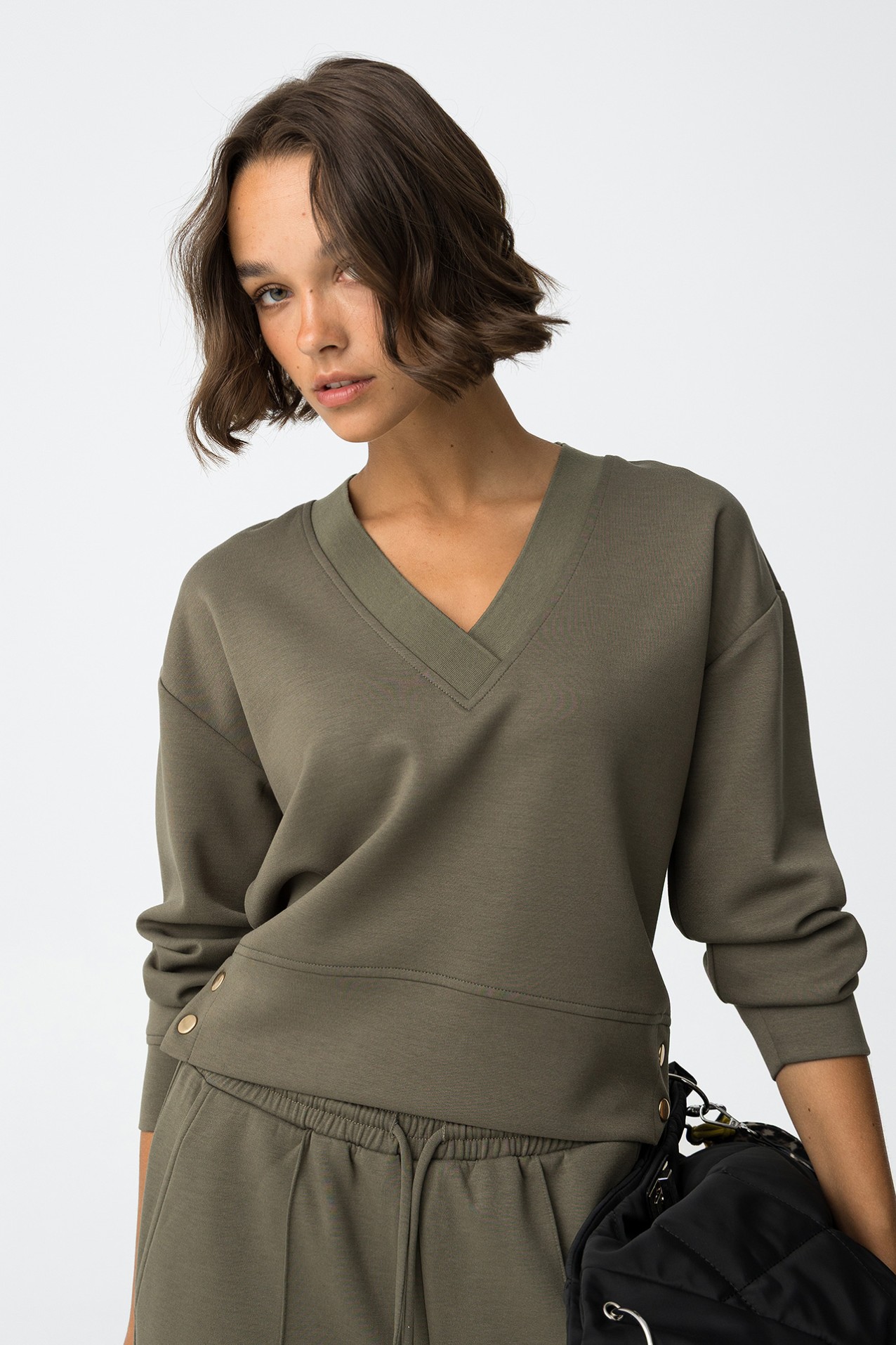 Sweat com Botes Metlicos