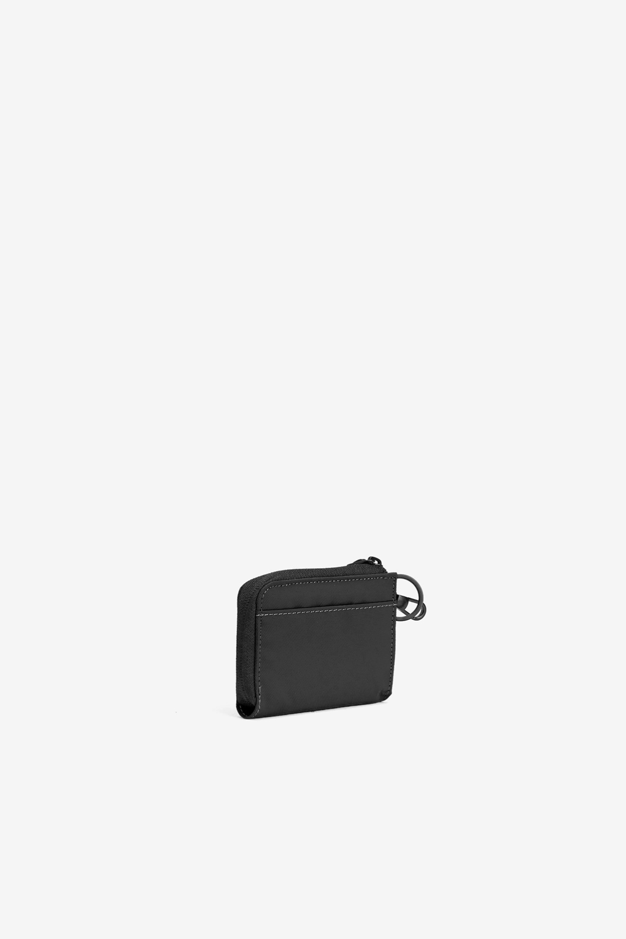Monedero negro compacto