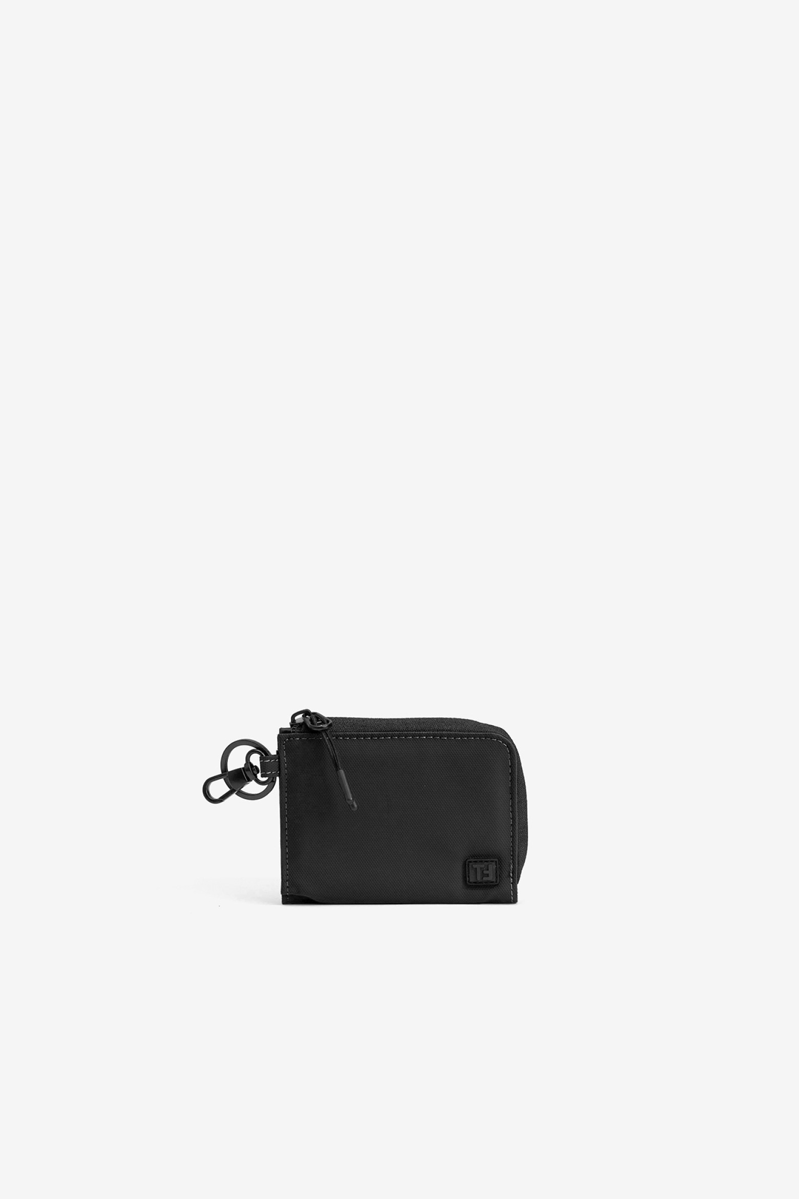 Monedero negro compacto