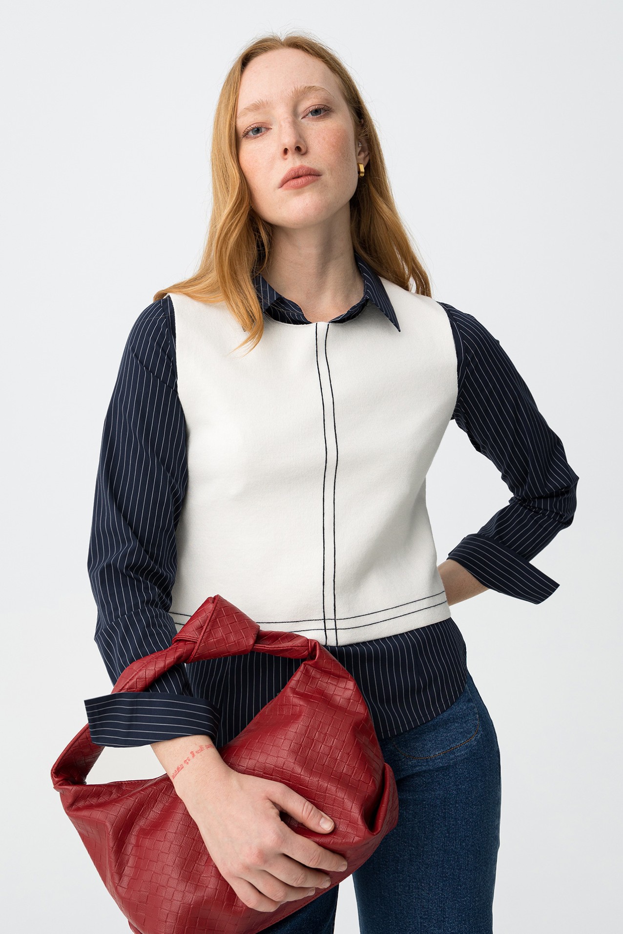 Off-white sleeveless knit top