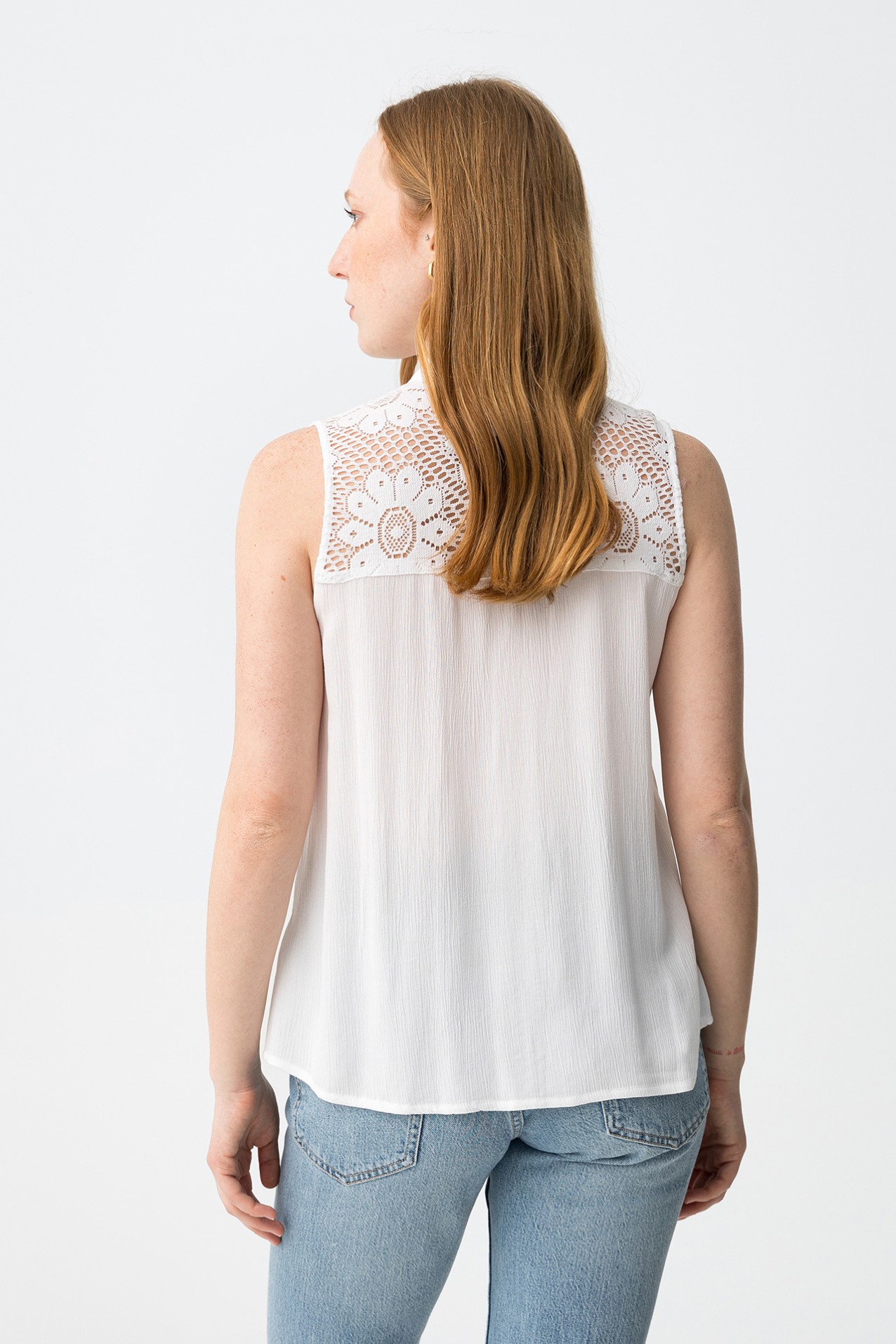 White sleeveless lace top