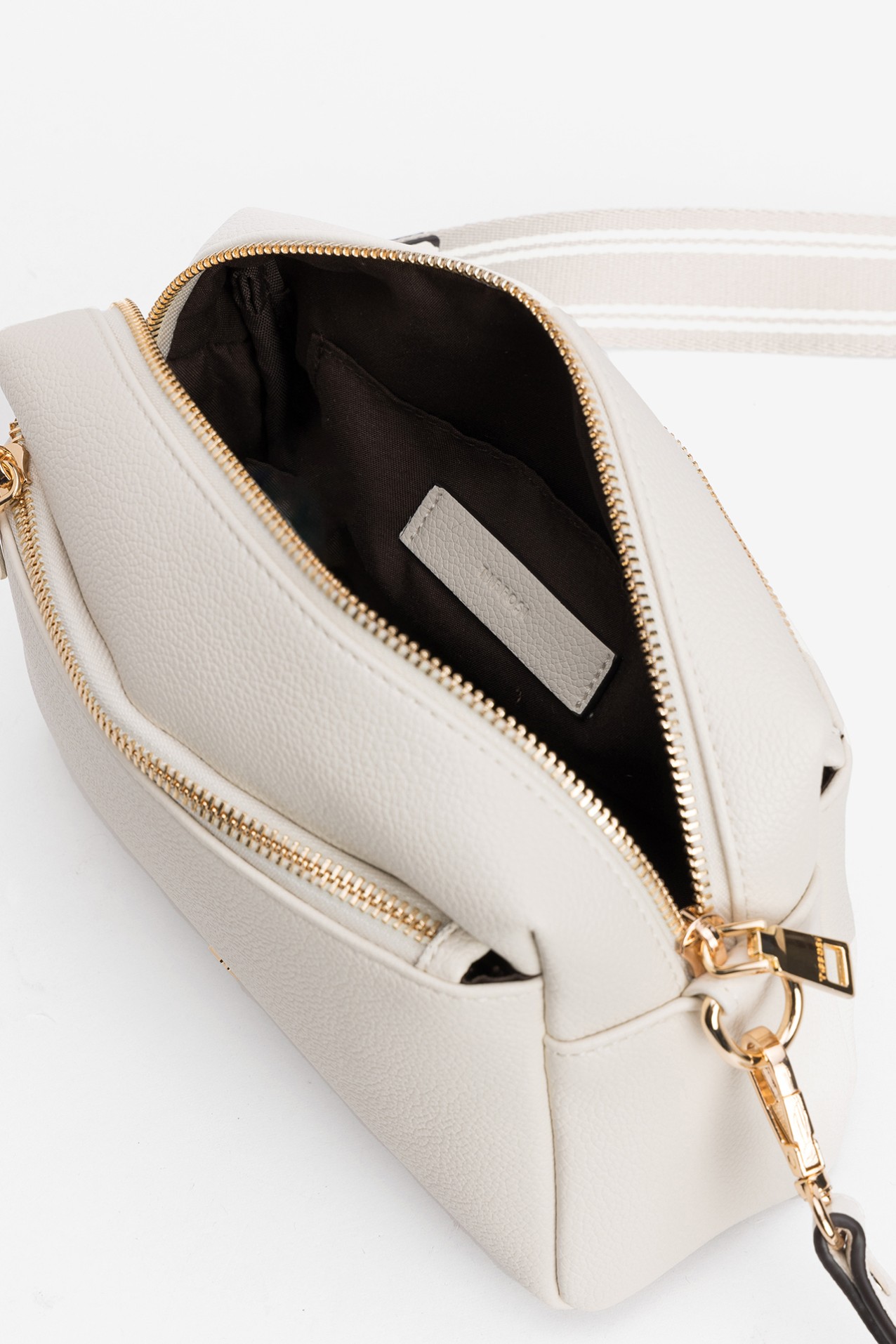 Bolso bandolera beige compacto