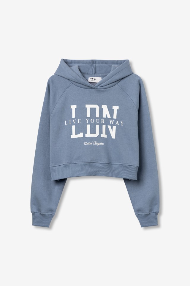 Sudadera crop azul con capucha