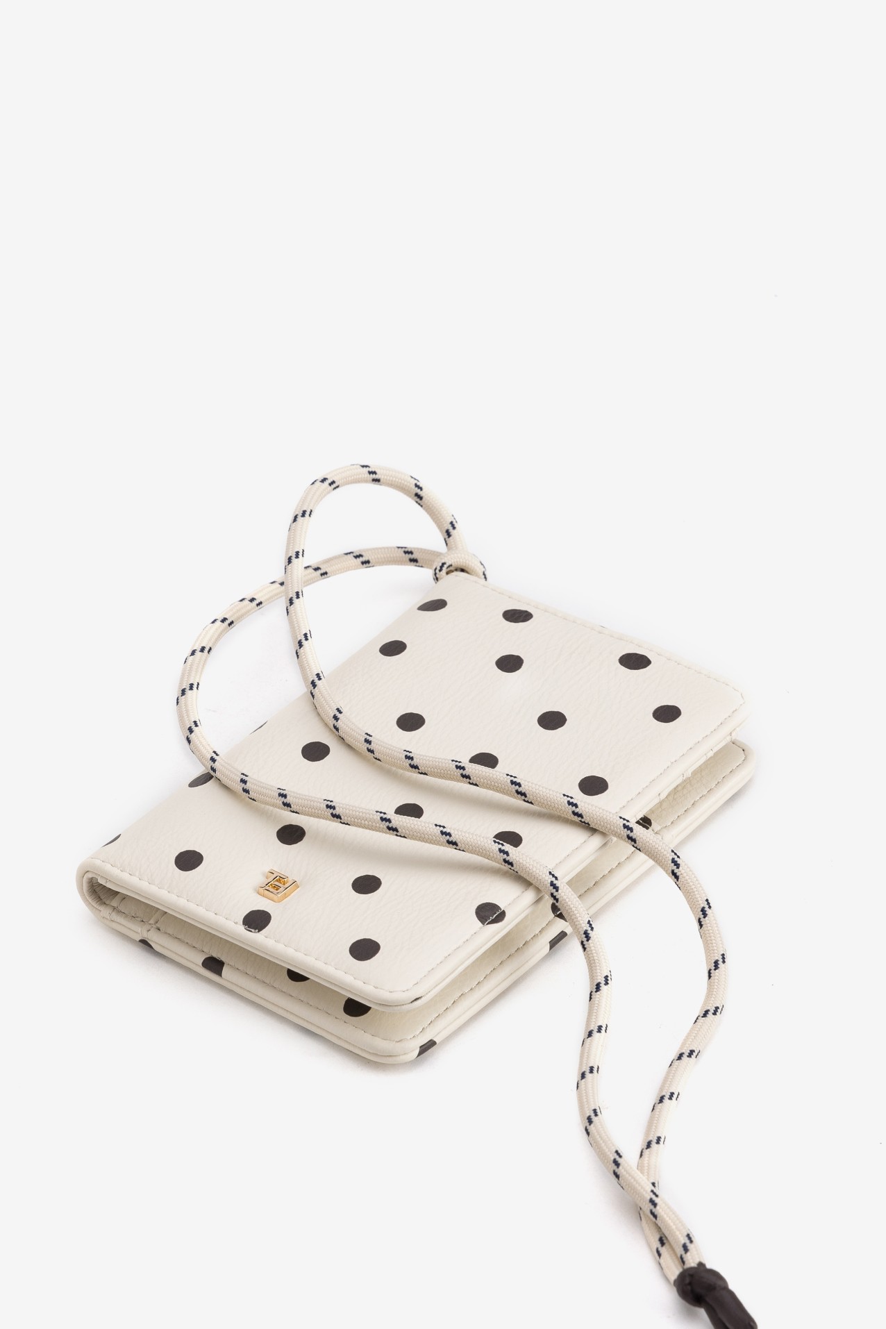 Porta-moedas bege �s bolinhas